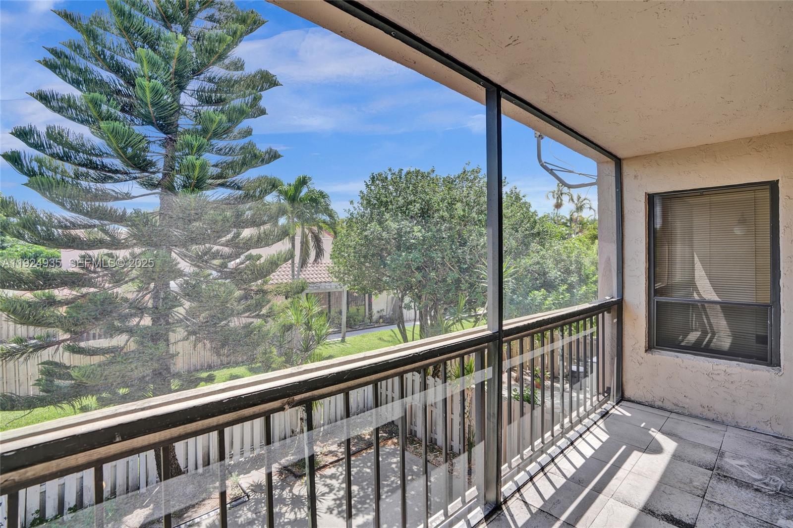 20607 Northeast 7th Court Miami, FL 33179 - Photo 27 of 49 a view of a glass door with a balcony