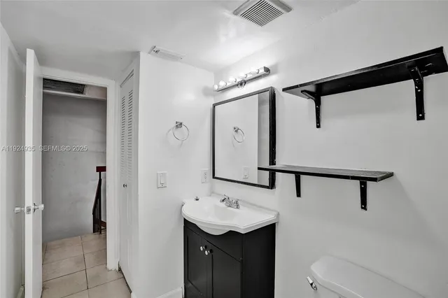 an empty room with sliding door