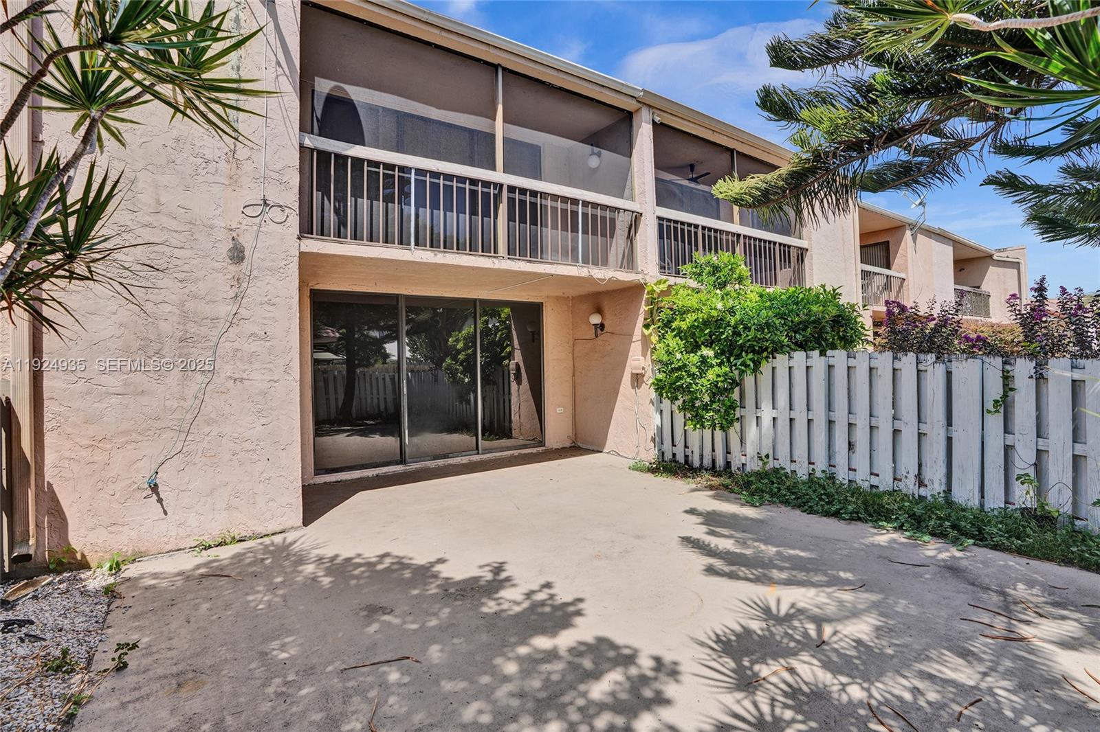 20607 Northeast 7th Court Miami, FL 33179 - Photo 45 of 49 a front view of a house with a yard