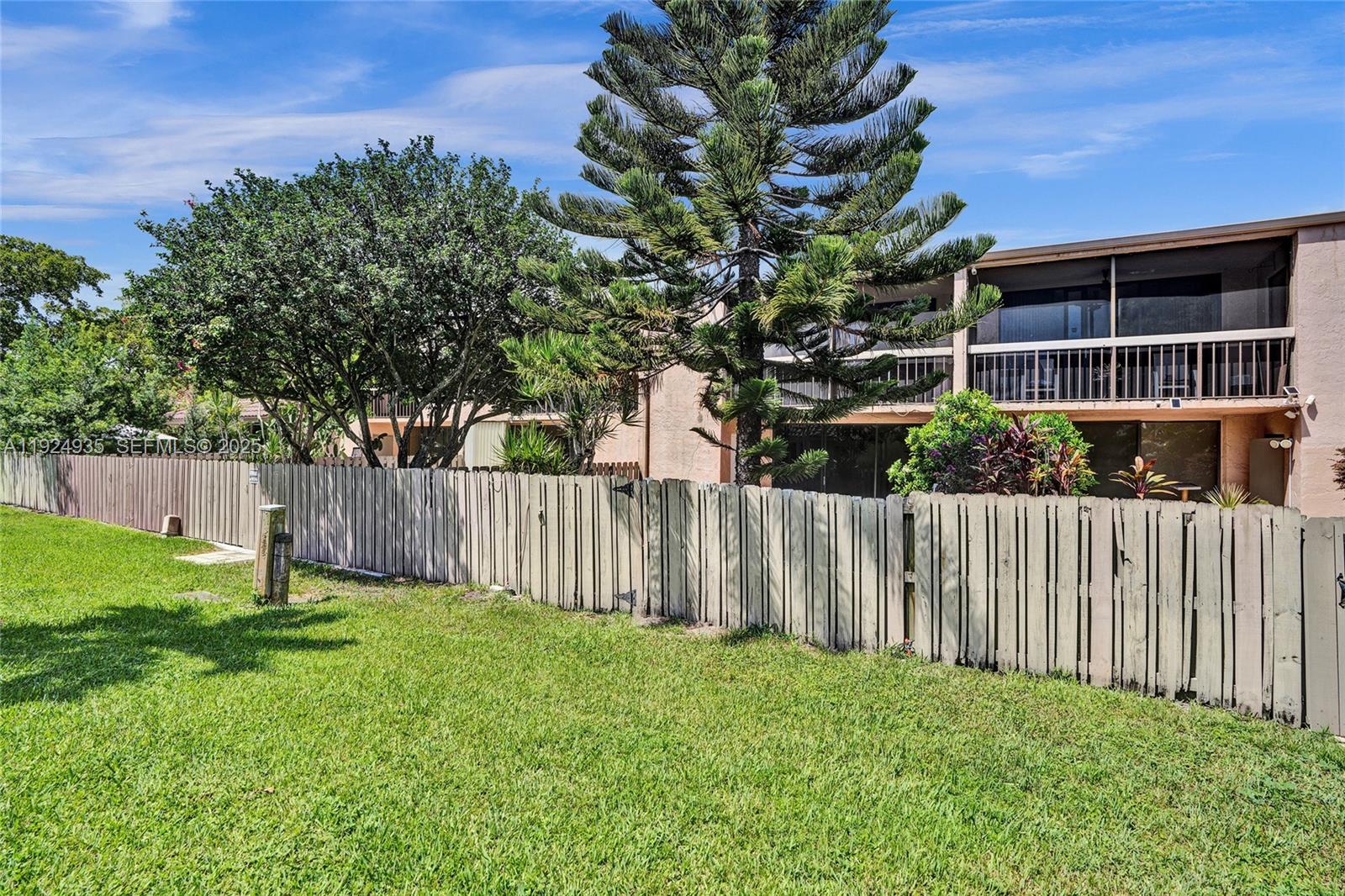 20607 Northeast 7th Court Miami, FL 33179 - Photo 48 of 49 a house view with a garden space