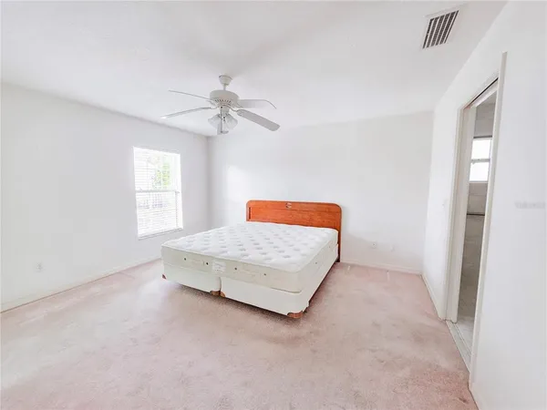 a bathroom with a sink a mirror and a shower