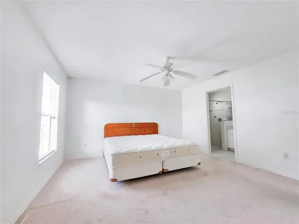 a bathroom with a sink a mirror and a shower