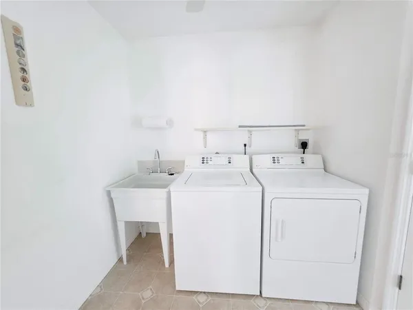 an aerial view of house with yard