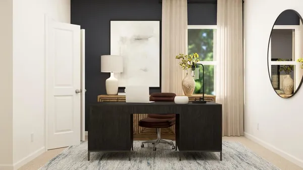 a dining room with table and chairs