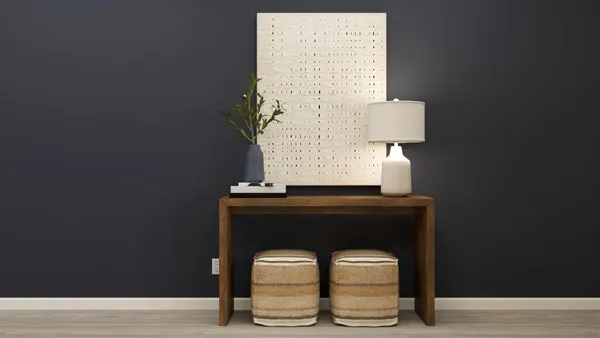 a room with a table and a mirror