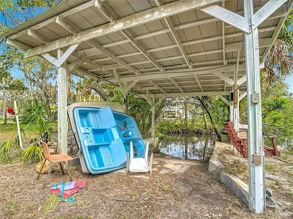 a view of a lake with a yard