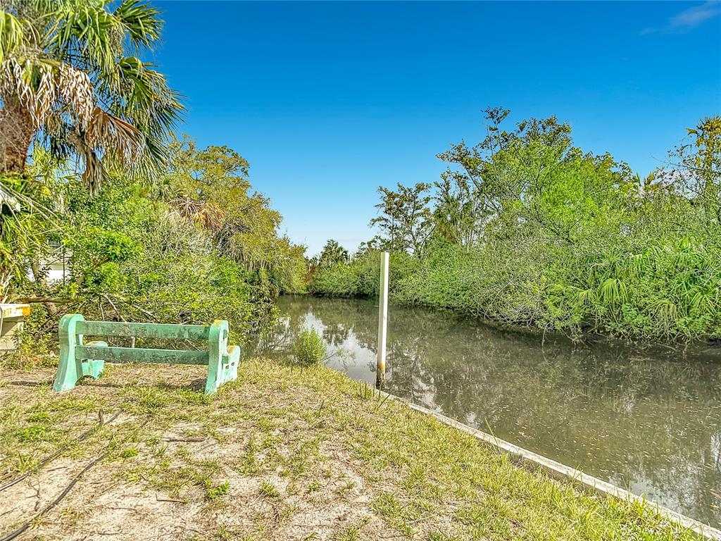 5362 Felker Drive Weeki Wachee, FL 34607 - Photo 20 of 21 a view of a lake with a yard
