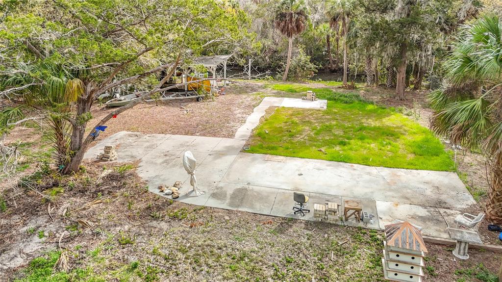 5362 Felker Drive Weeki Wachee, FL 34607 - Photo 4 of 21 a view of yard with swimming pool