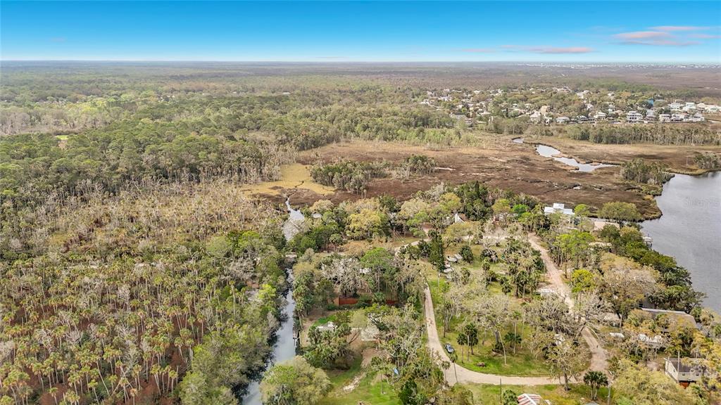 5362 Felker Drive Weeki Wachee, FL 34607 - Photo 7 of 21 an aerial view of residential houses with outdoor space