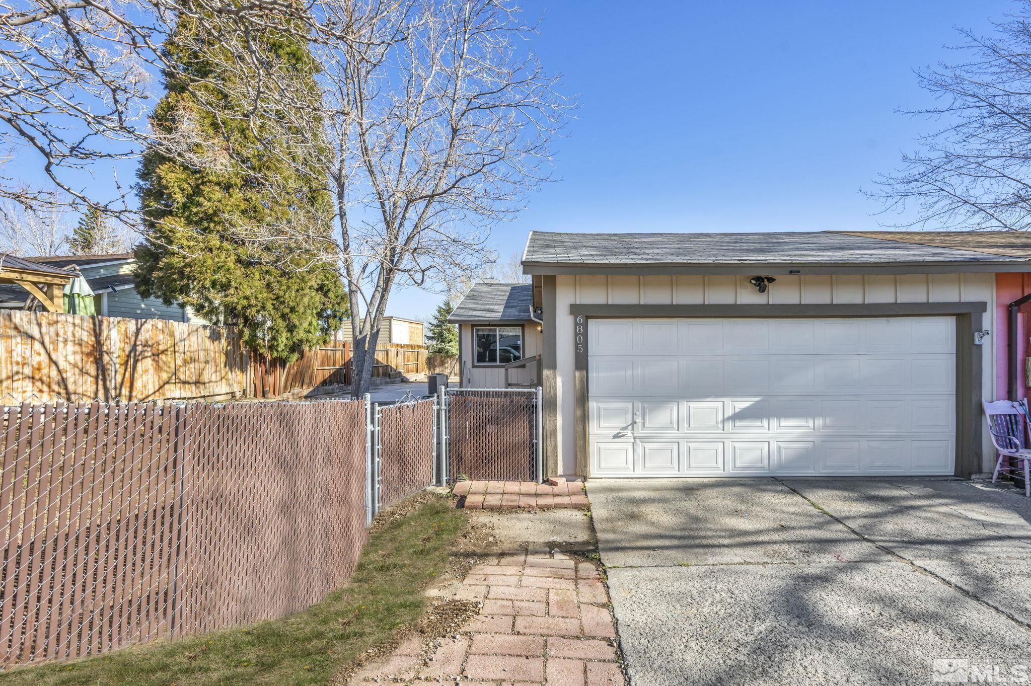 6805 Peppermint Drive Reno, NV 89506 - Photo 1 of 26 a view of a door of the house