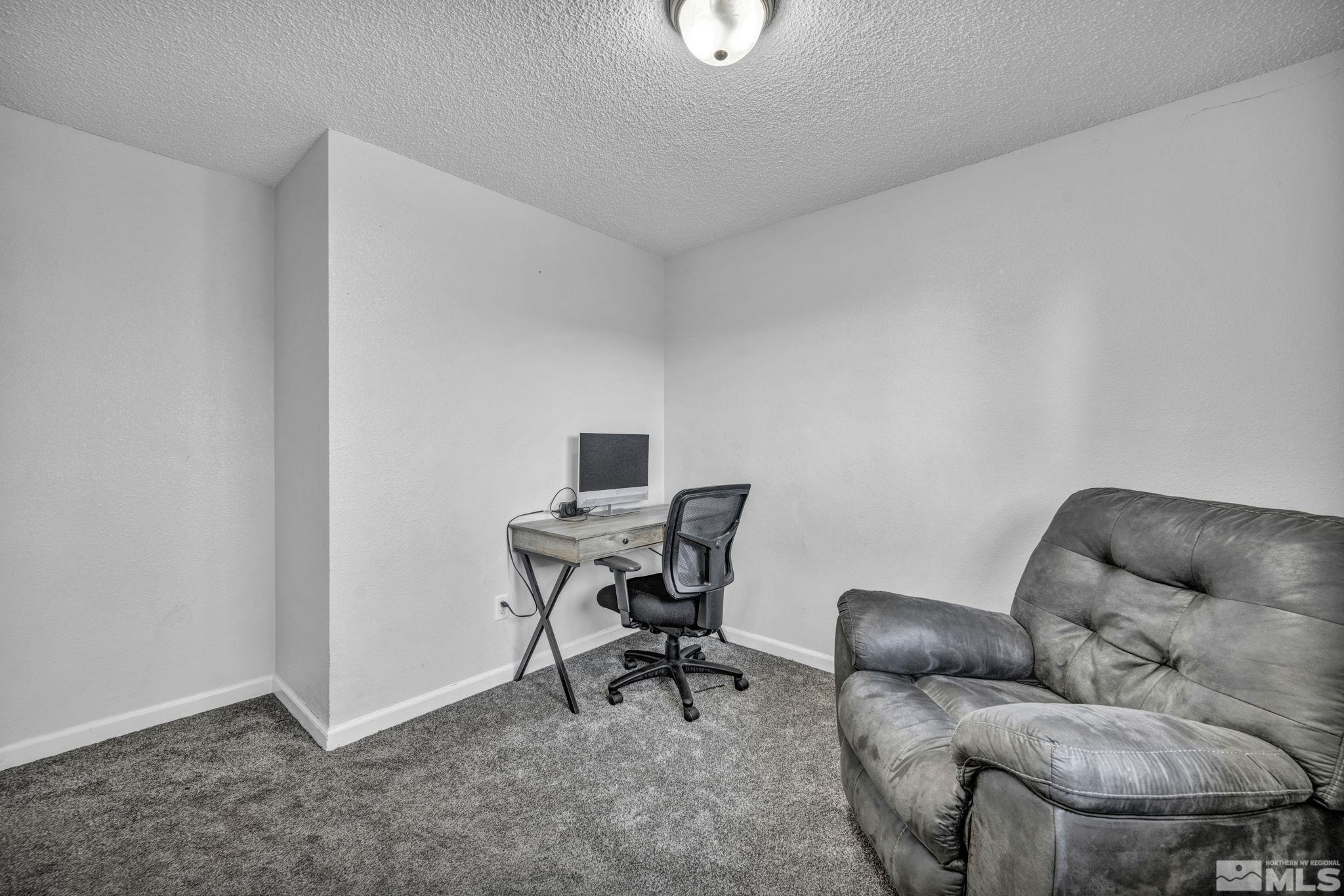 6805 Peppermint Drive Reno, NV 89506 - Photo 16 of 26 a work room with furniture and a window
