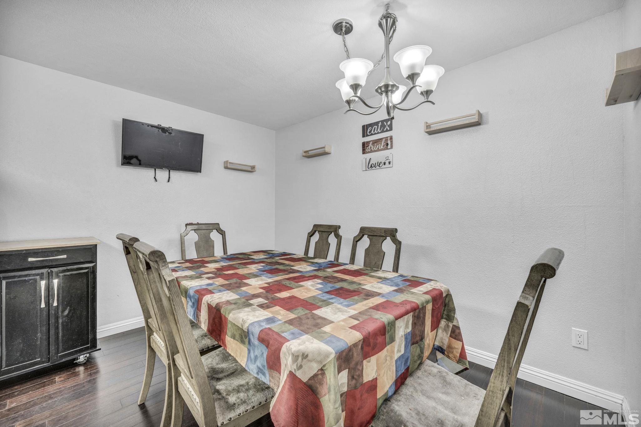 6805 Peppermint Drive Reno, NV 89506 - Photo 10 of 26 a bedroom with a bed and a flat screen tv