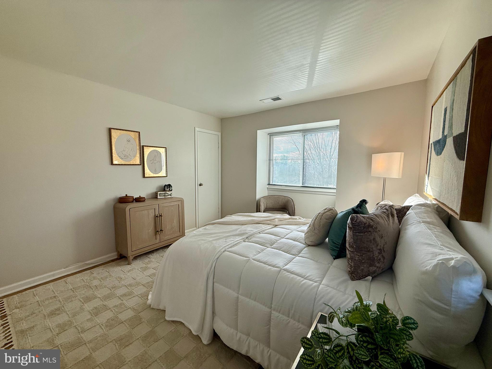 5355 Smooth Meadow Way, Unit 5 Columbia, MD 21044 - Photo 17 of 26 a bedroom with a bed and a window