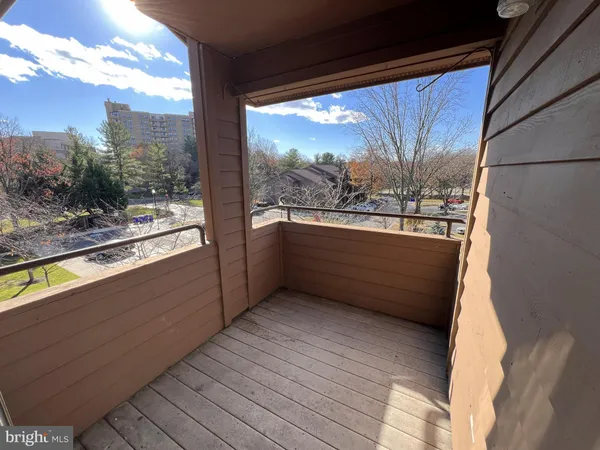 a view of balcony with furniture