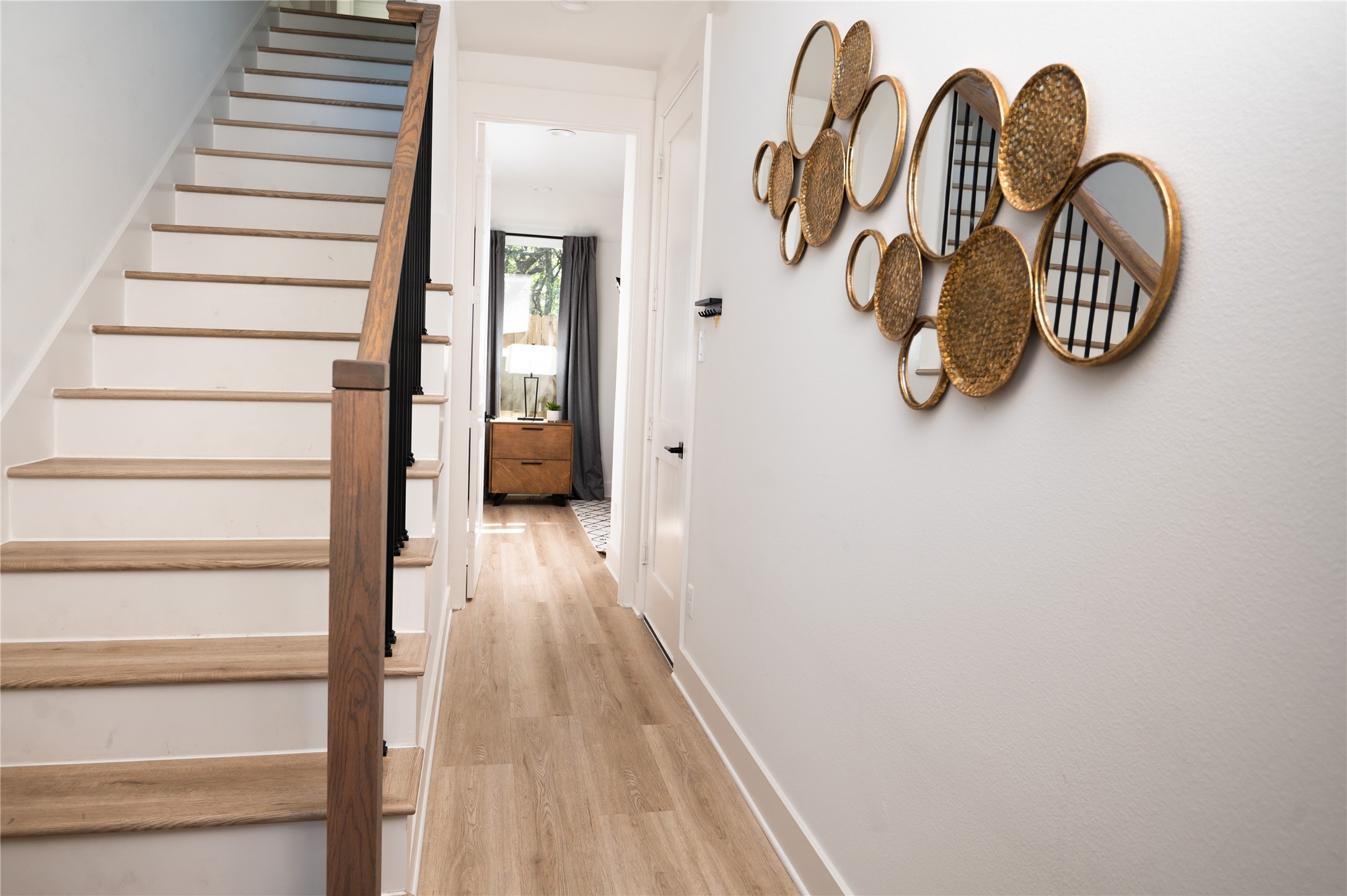 3486 Luca Street Houston, TX 77021 - Photo 2 of 50 Hallway upon entering the front door and leading to the downstairs bedroom.