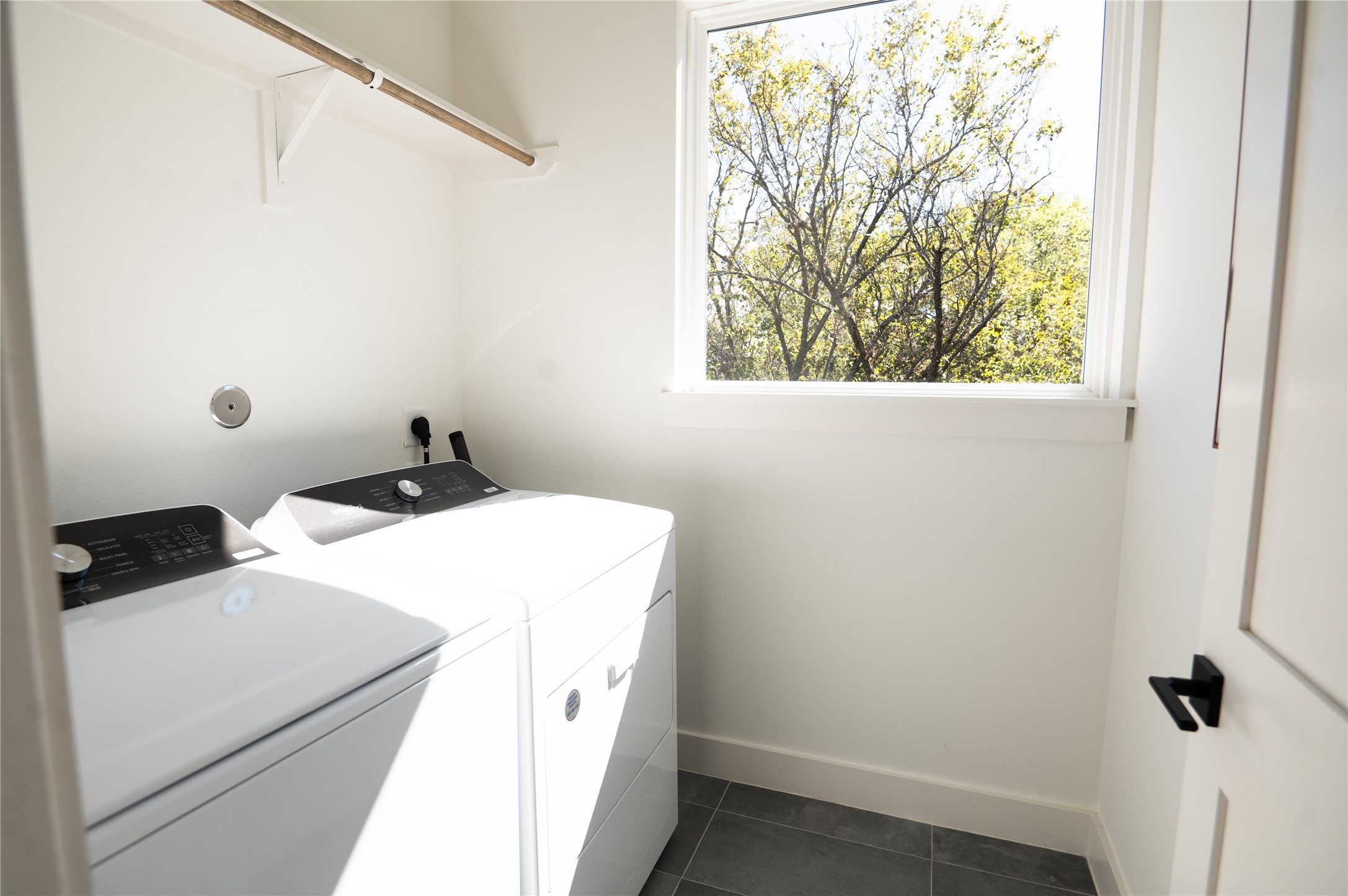 3486 Luca Street Houston, TX 77021 - Photo 49 of 50 Utility room situated on 3rd floor with a door to reduce laundry noise