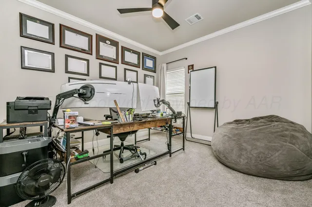 a bathroom with a granite countertop sink a toilet and a mirror