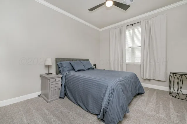 a bathroom with a granite countertop sink a mirror a bathtub and shower
