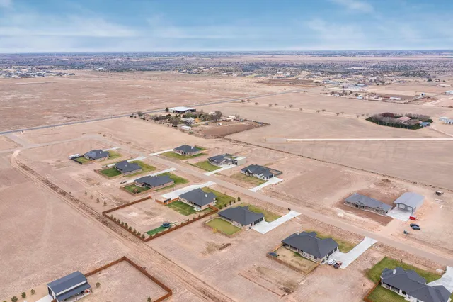 a view of a swimming pool with an ocean view