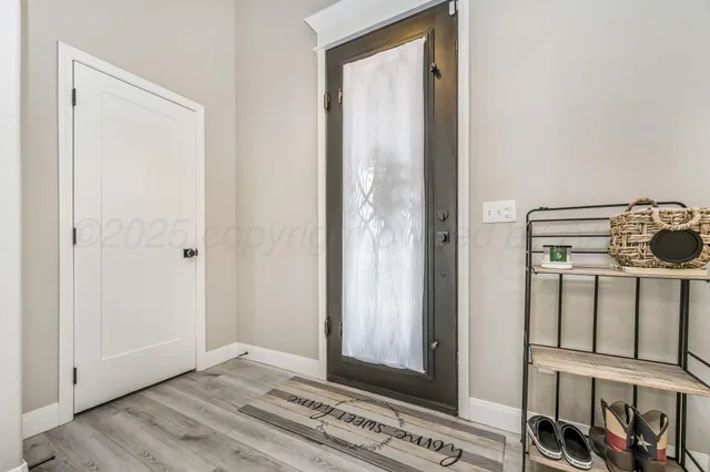 a spacious bedroom with a bed and furniture