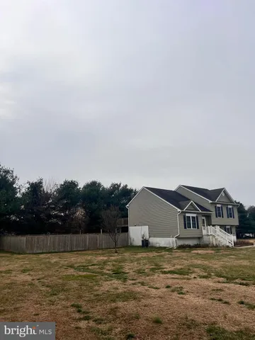 a house with river in front of it
