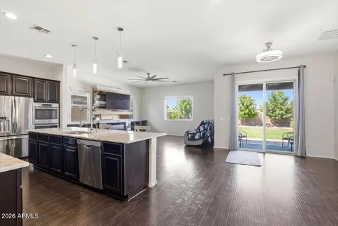 a bathroom with a double vanity sink mirror double and bathtub