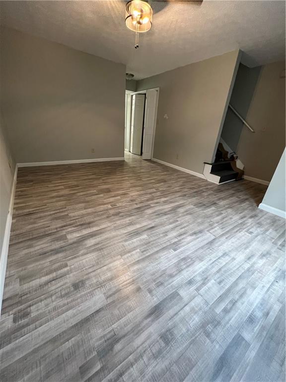 333 Forsyth Street, Unit A Barnesville, GA 30204 - Photo 5 of 5 a view of empty room with wooden floor