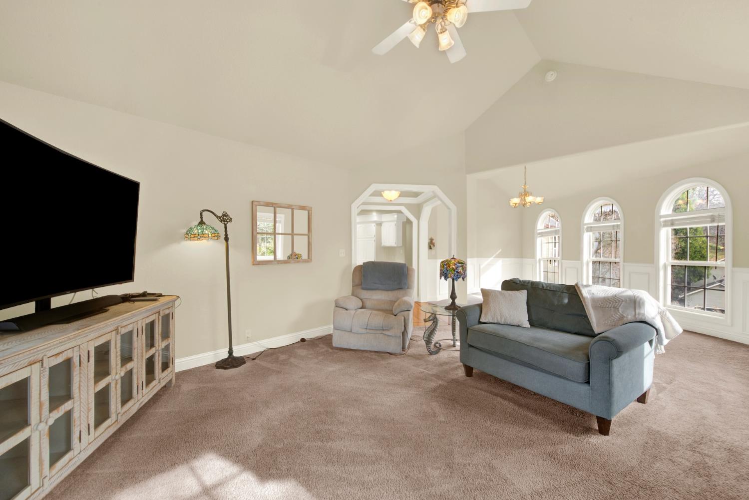 2812 Bronzecrest Street Placerville, CA 95667 - Photo 17 of 74 a living room with furniture and a flat screen tv