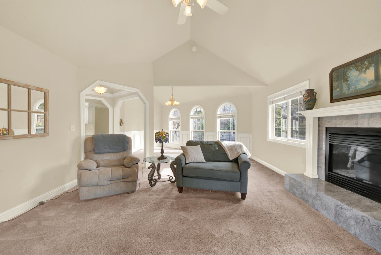 2812 Bronzecrest Street Placerville, CA 95667 - Photo 18 of 74 a living room with furniture and a fireplace