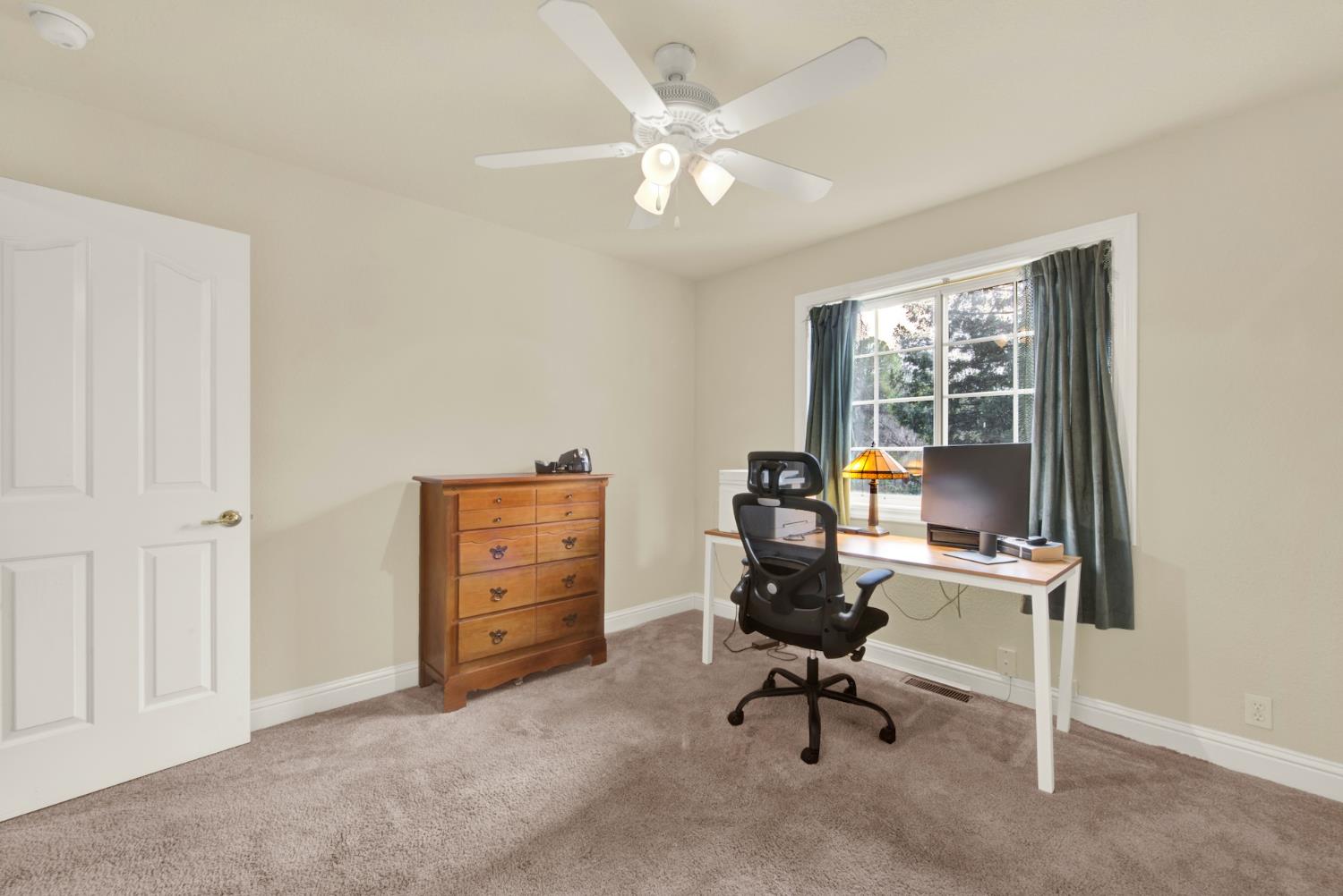2812 Bronzecrest Street Placerville, CA 95667 - Photo 48 of 74 a view of a workspace with furniture and a window