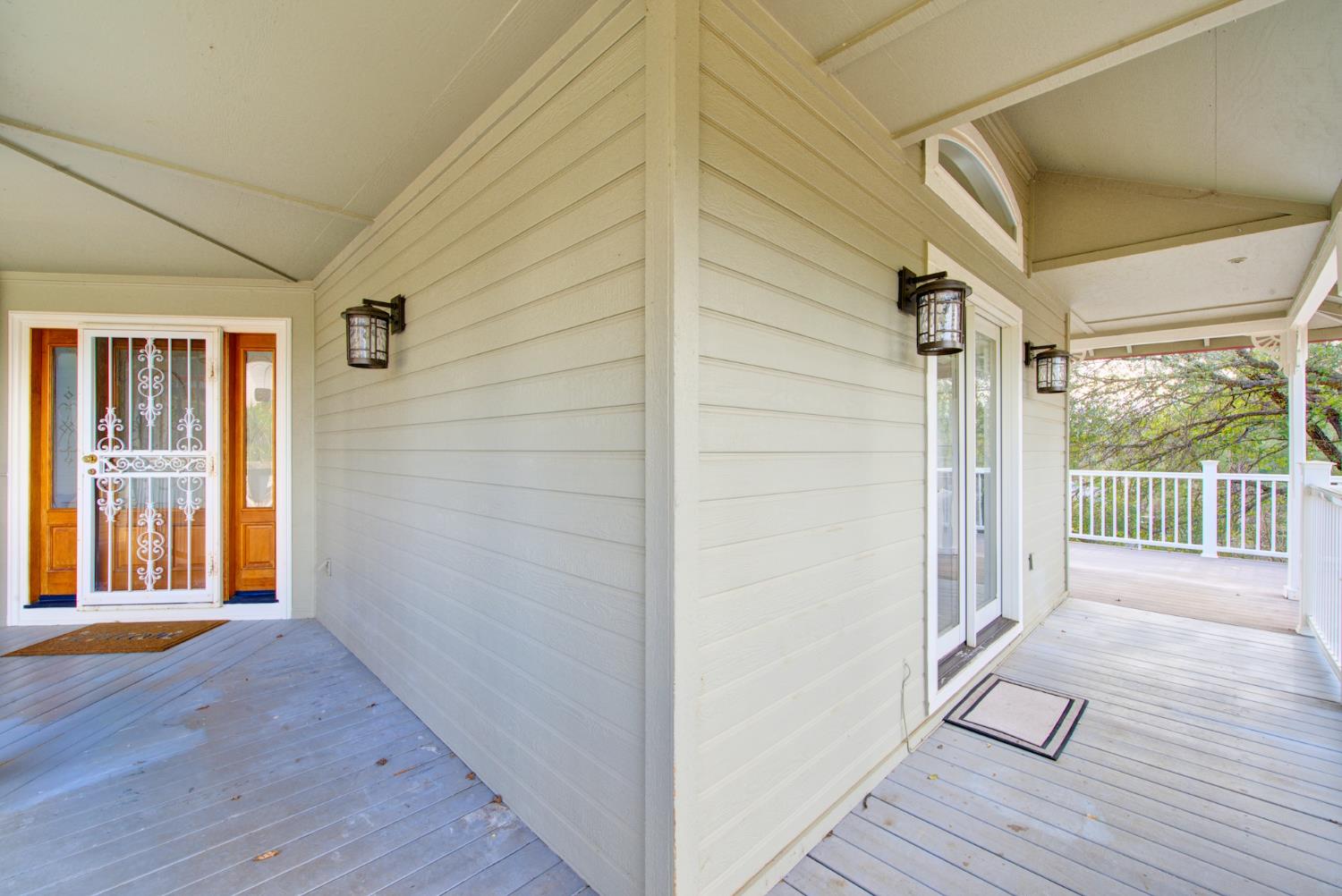 2812 Bronzecrest Street Placerville, CA 95667 - Photo 57 of 74 a view of a porch with wooden floor and front door