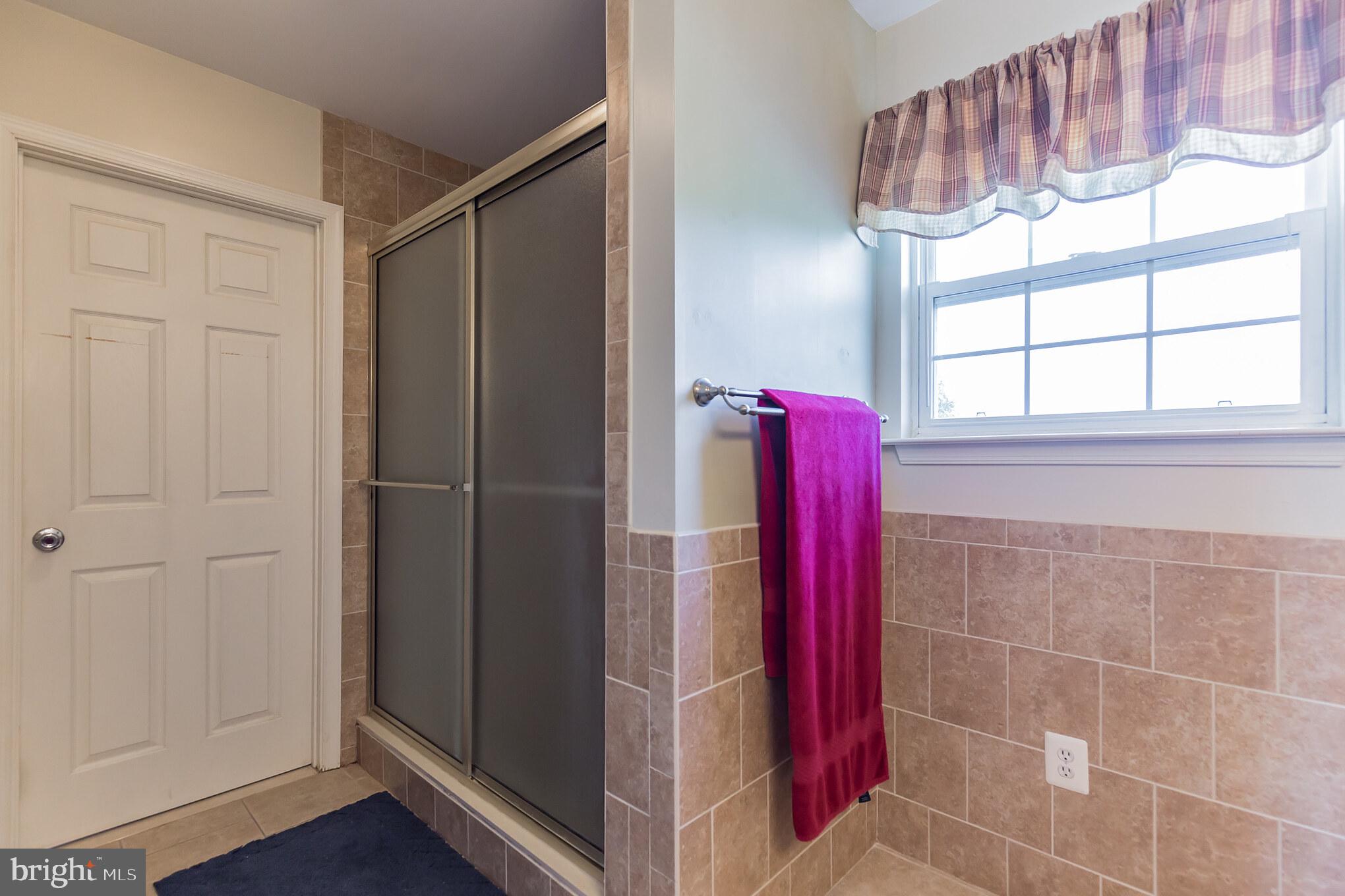 4255 Hardesty Road Huntingtown, MD 20639 - Photo 25 of 35 Master bathroom with connecting door to laundry rm