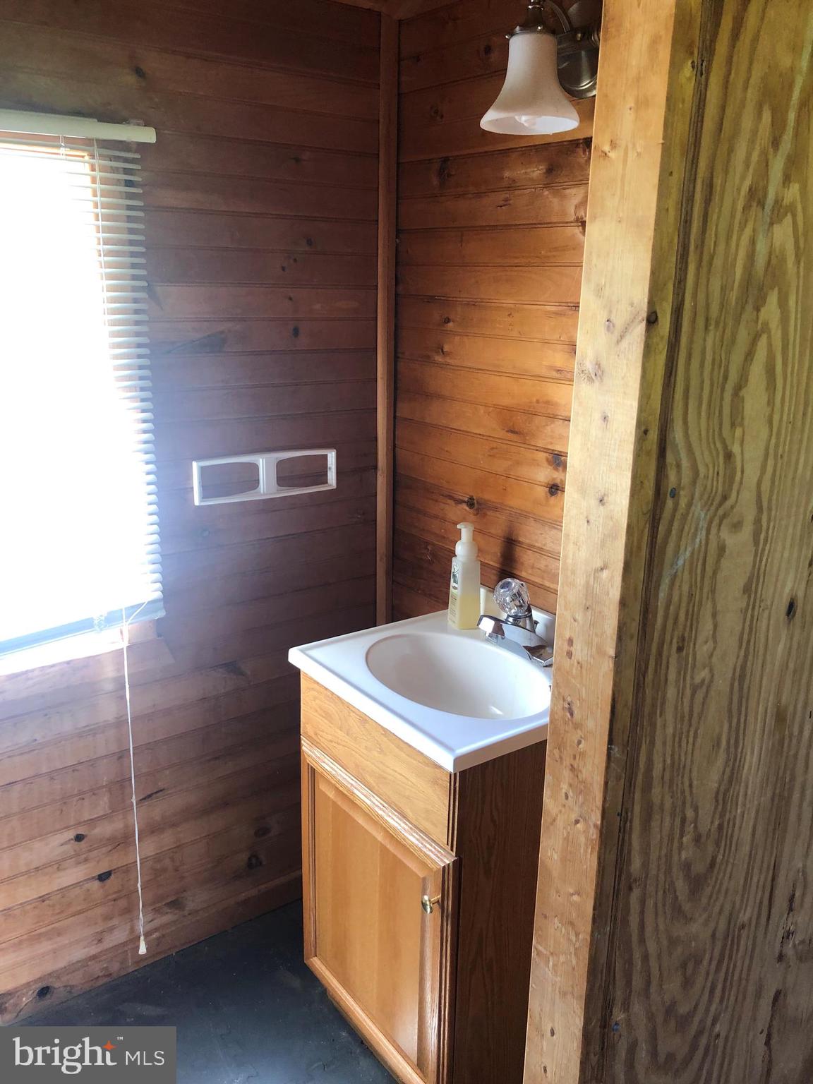 4255 Hardesty Road Huntingtown, MD 20639 - Photo 33 of 35 Pool house half bathroom