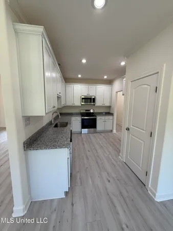 $420,000 | 37 Honey Suckle Cove, Holly Springs, MS 38635