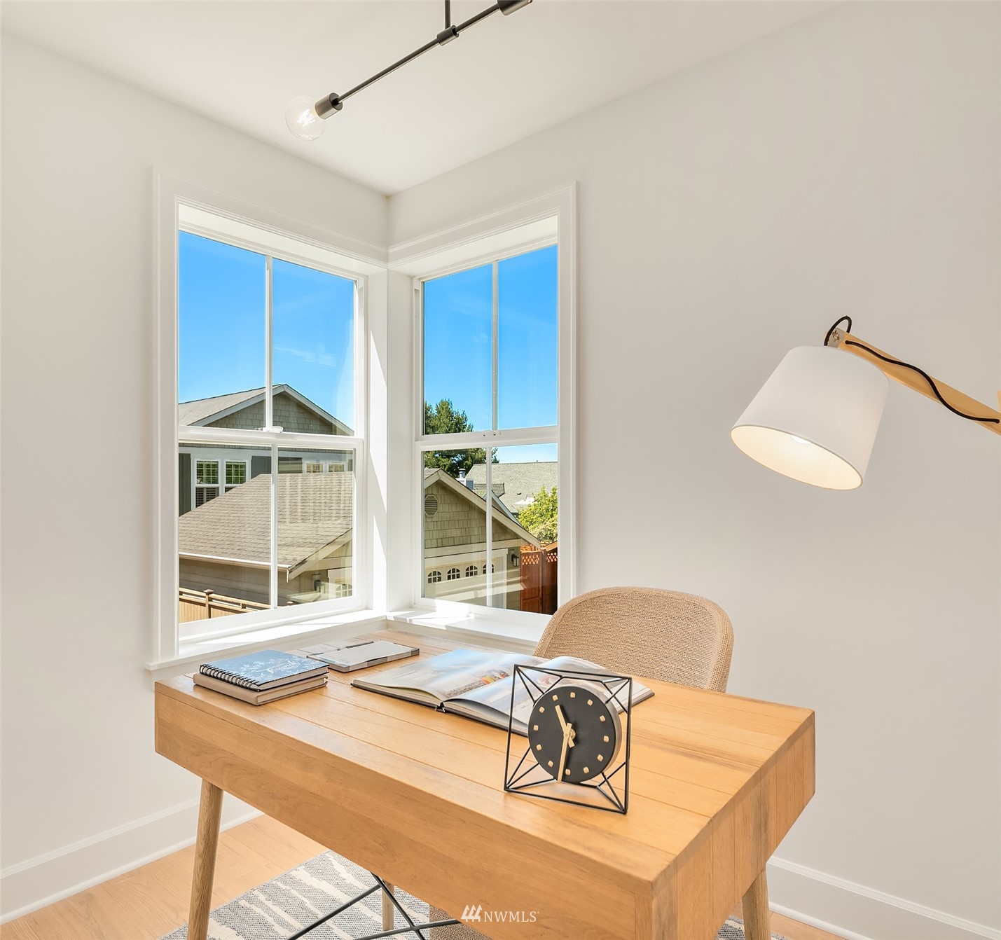 8041 Stroud Avenue North, Unit B Seattle, WA 98103 - Photo 12 of 29 a living room with furniture and a window