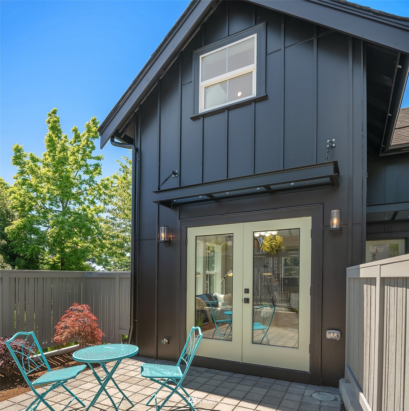 8041 Stroud Avenue North, Unit B Seattle, WA 98103 - Photo 23 of 29 a outdoor space with a fireplace
