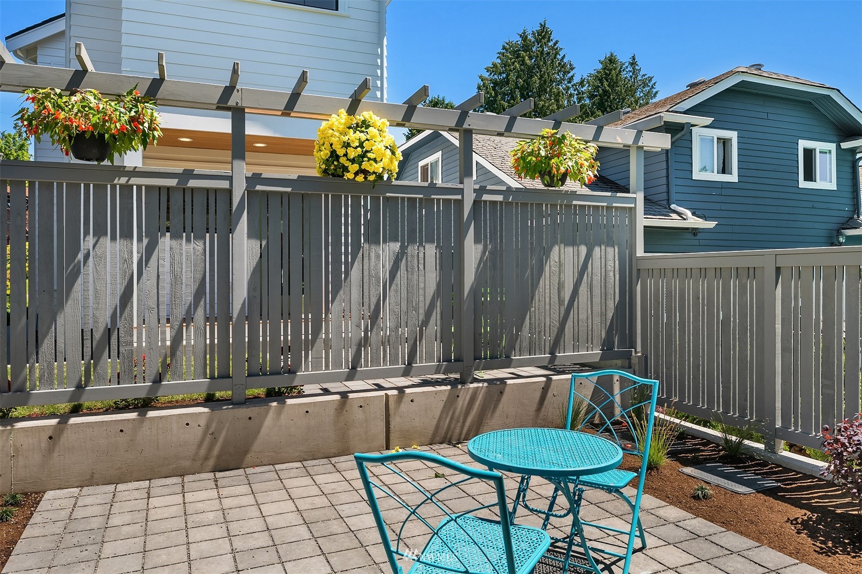 8041 Stroud Avenue North, Unit B Seattle, WA 98103 - Photo 24 of 29 a view of a chairs and table in the balcony