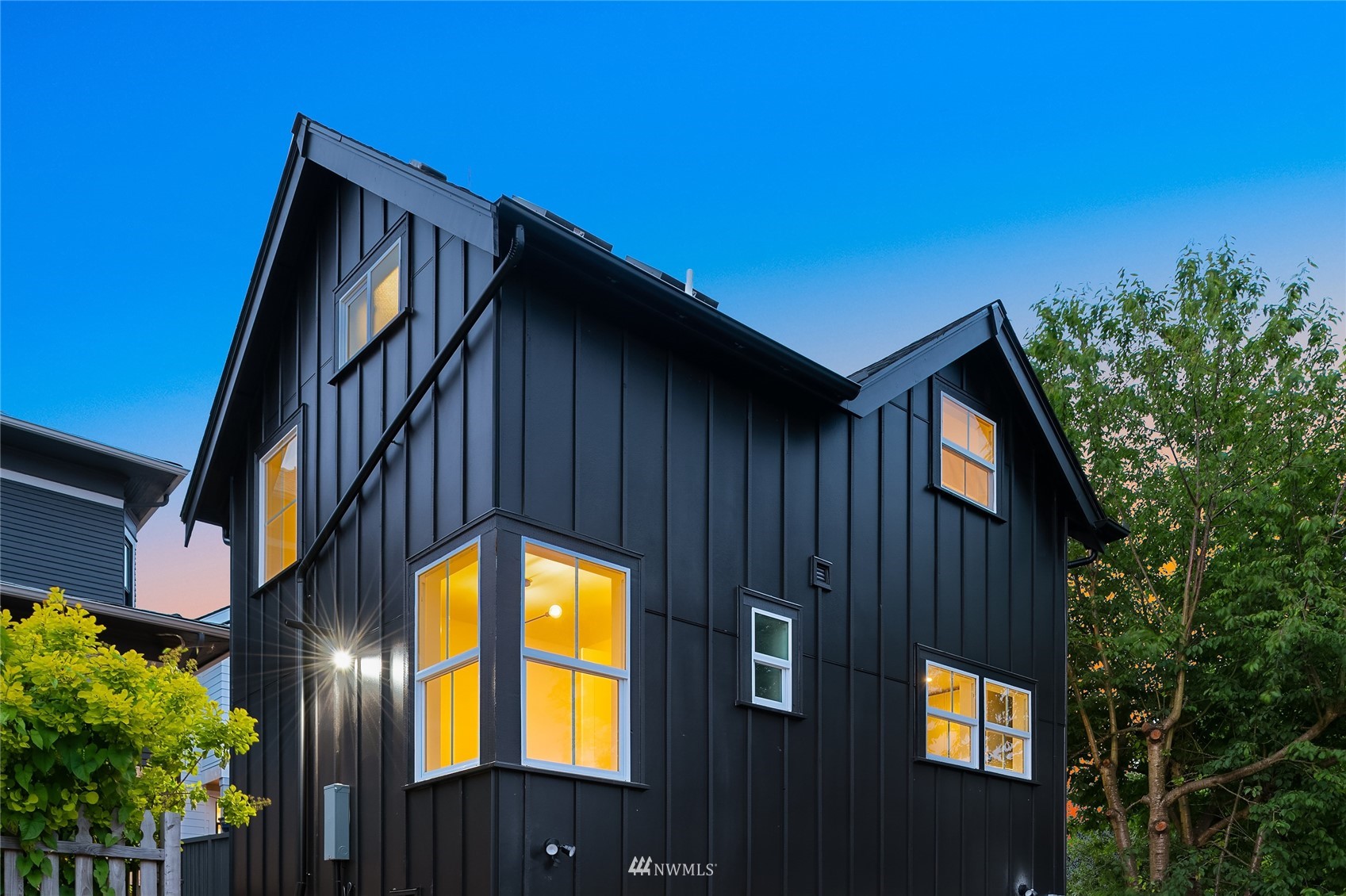 8041 Stroud Avenue North, Unit B Seattle, WA 98103 - Photo 27 of 29 a view of a house with a swimming pool