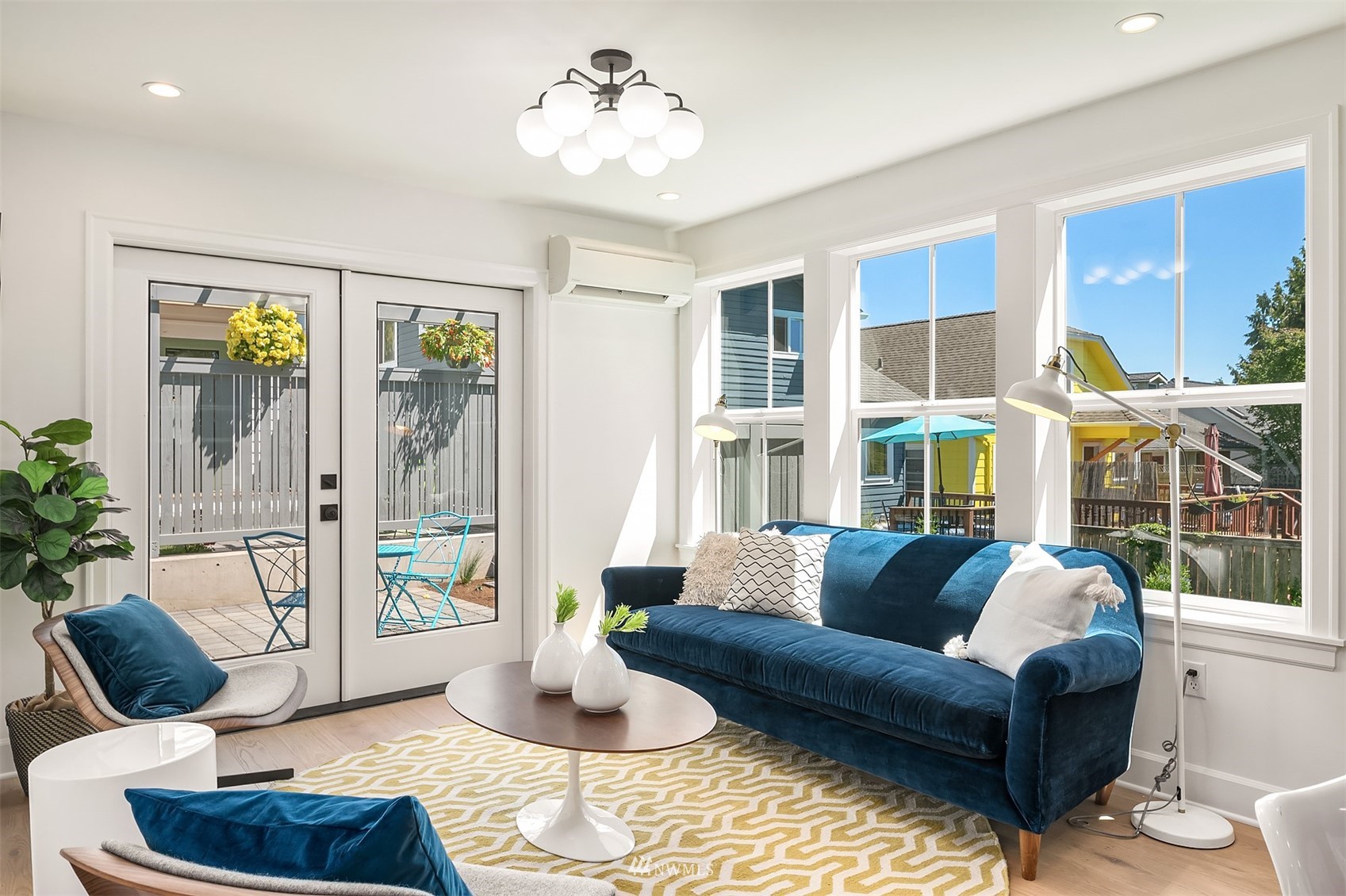 8041 Stroud Avenue North, Unit B Seattle, WA 98103 - Photo 4 of 29 a living room with furniture and a large window