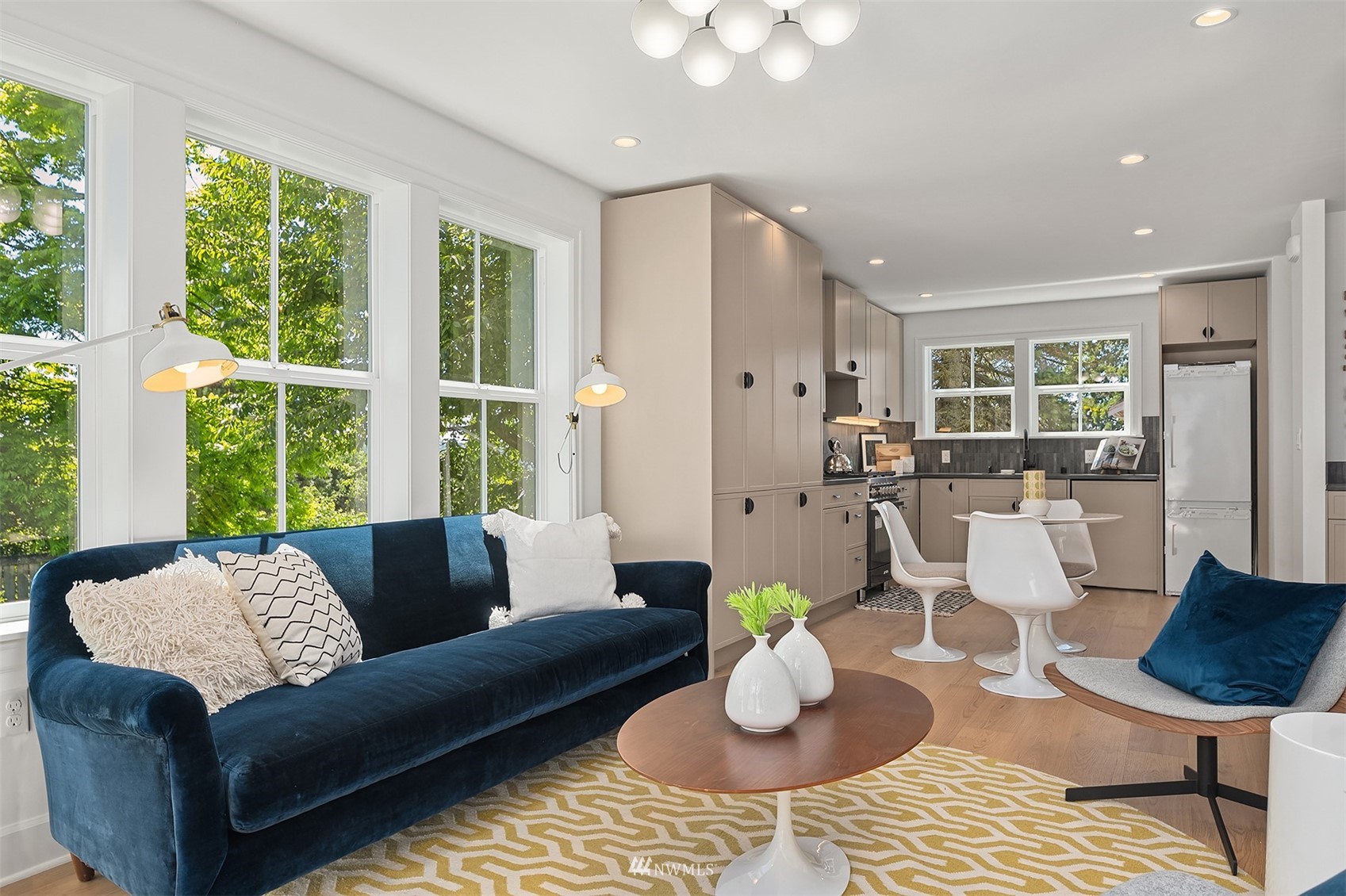 8041 Stroud Avenue North, Unit B Seattle, WA 98103 - Photo 5 of 29 a living room with furniture and a large window