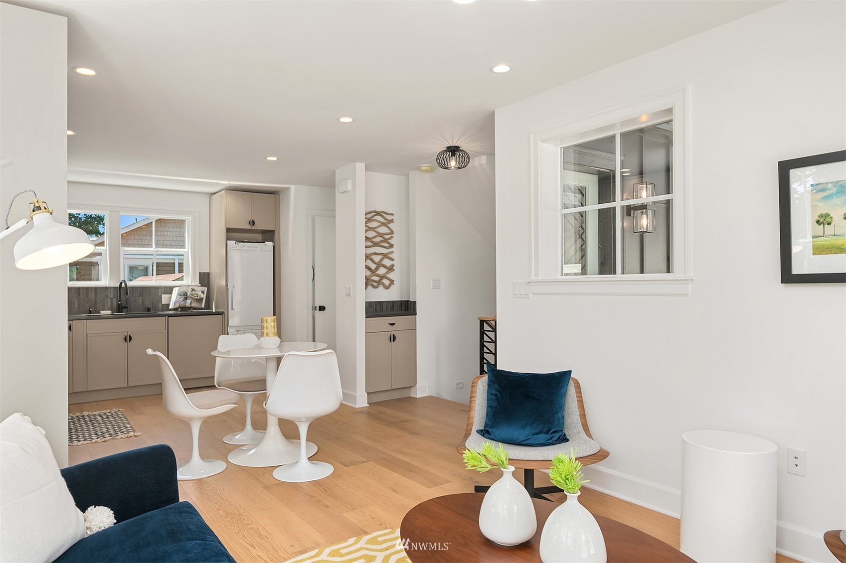8041 Stroud Avenue North, Unit B Seattle, WA 98103 - Photo 6 of 29 a living room with furniture and a window