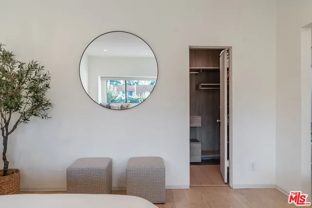 a bathroom with a bathtub and window