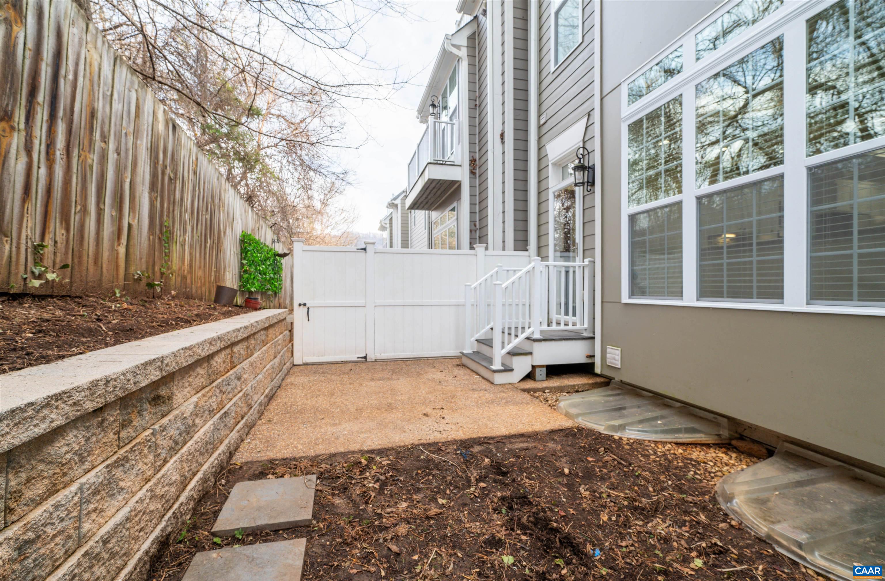 2054 Avinity Loop Charlottesville, VA 22902 - Photo 45 of 62 a view of a house with a yard