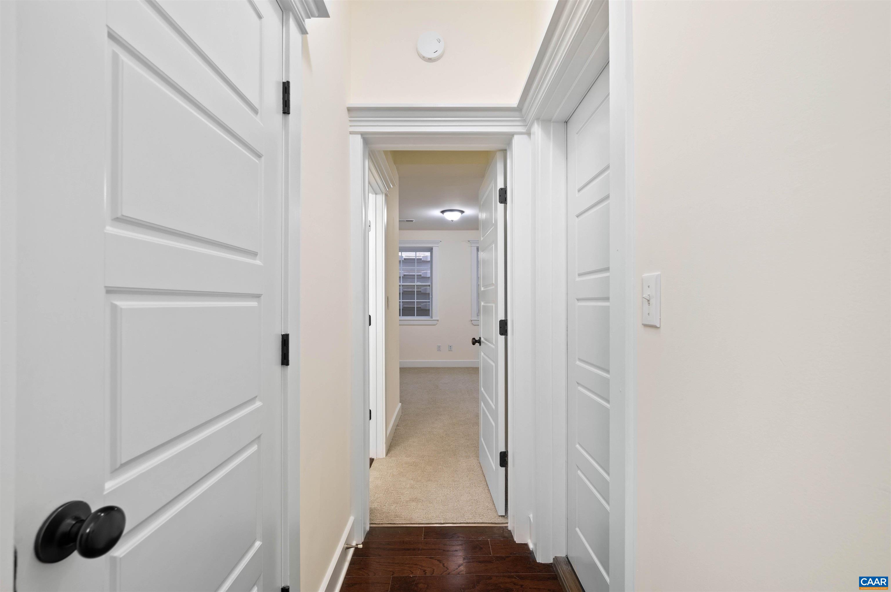 2054 Avinity Loop Charlottesville, VA 22902 - Photo 5 of 62 a view of a hallway with wooden floor and closet