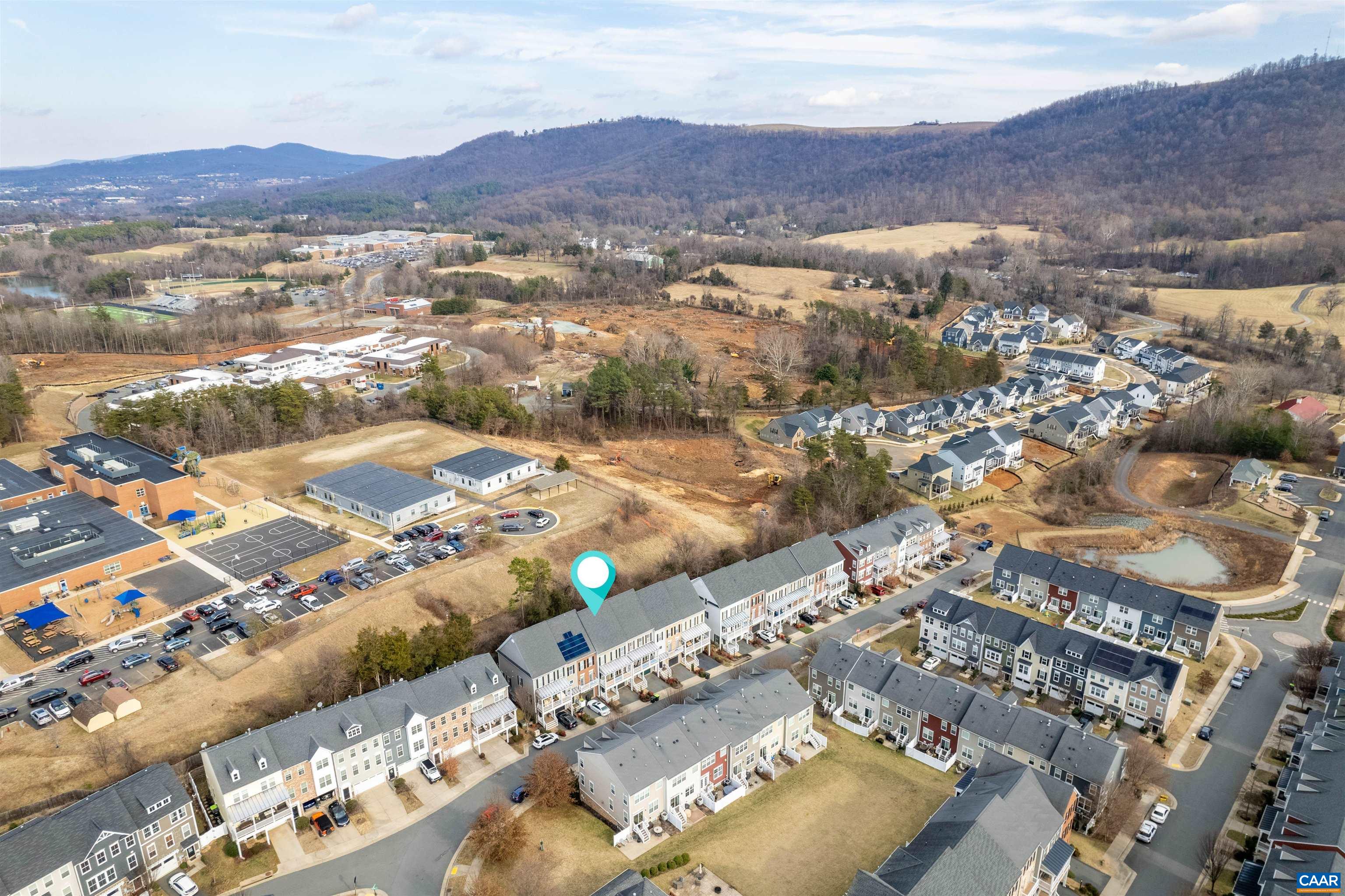 2054 Avinity Loop Charlottesville, VA 22902 - Photo 58 of 62 an aerial view of residential houses and outdoor space