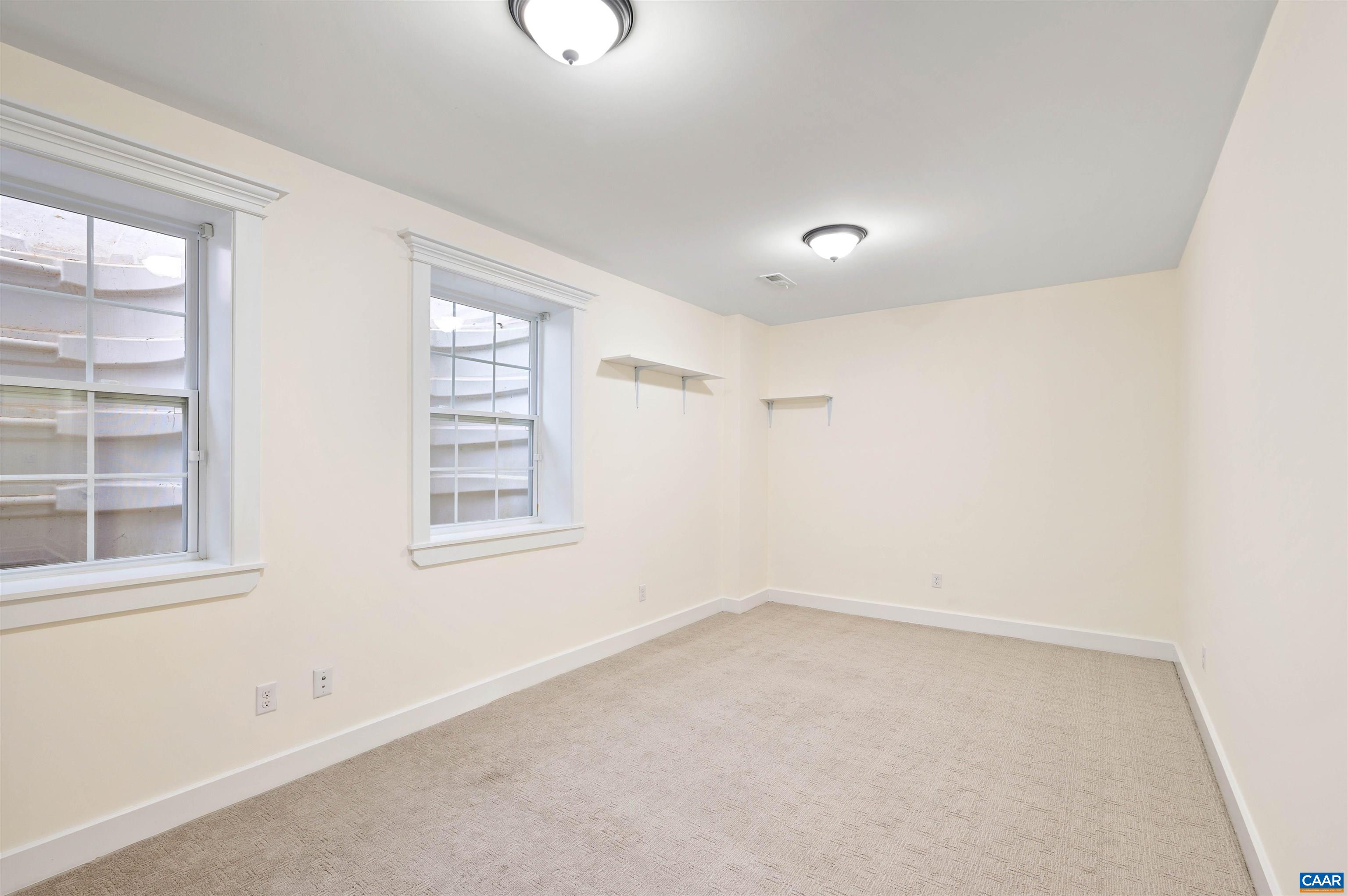 2054 Avinity Loop Charlottesville, VA 22902 - Photo 6 of 62 an empty room with a empty space and windows