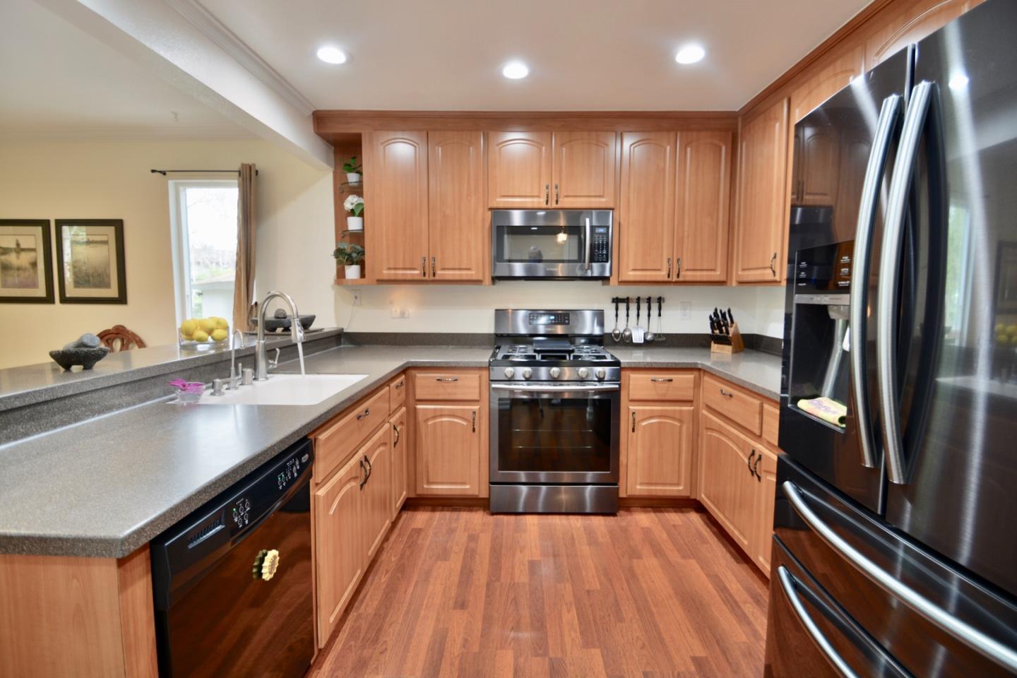 2298 Almaden Road, Unit A San Jose, CA 95125 - Photo 17 of 43 a kitchen with stainless steel appliances granite countertop a sink stove and refrigerator