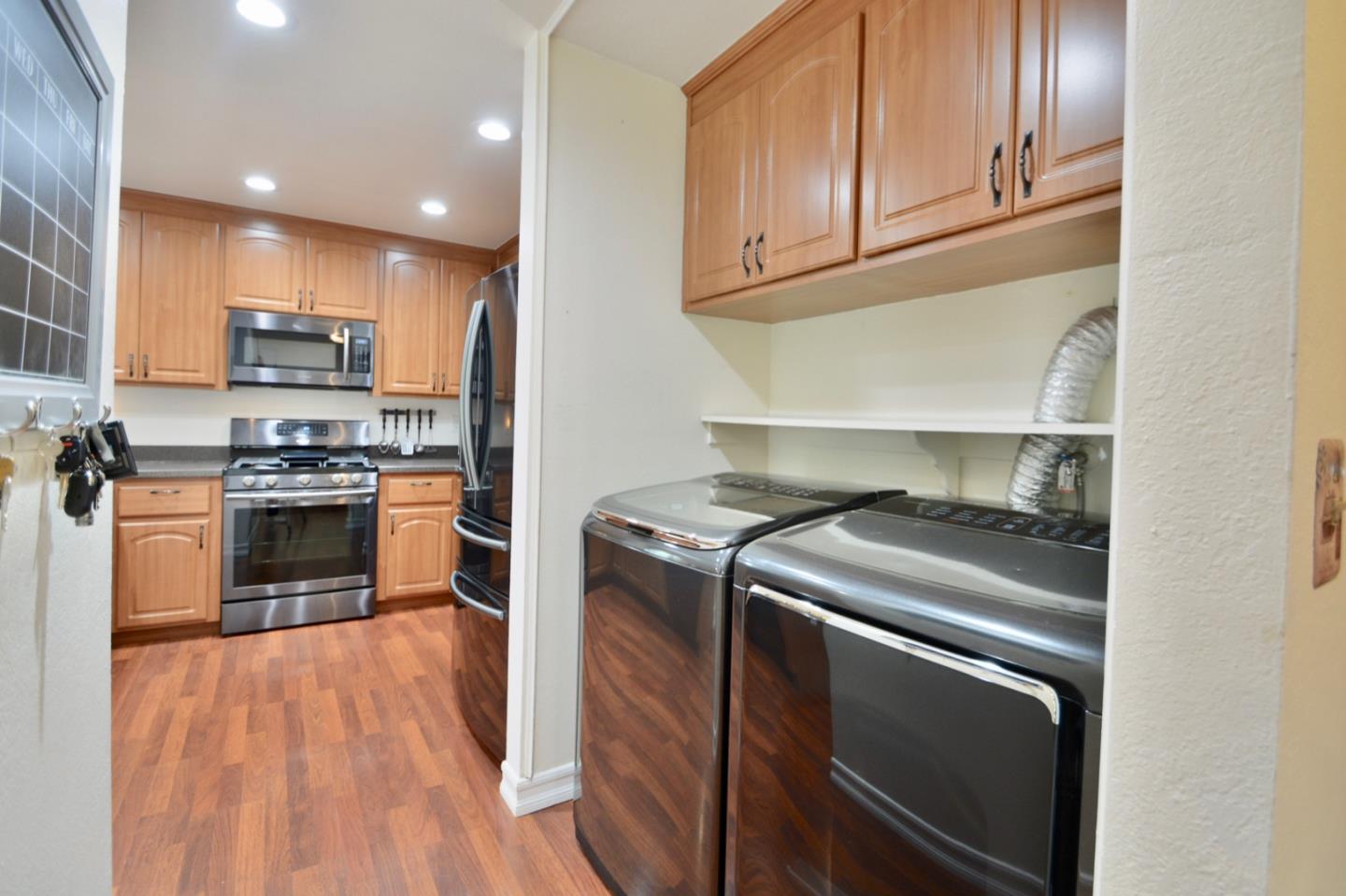 2298 Almaden Road, Unit A San Jose, CA 95125 - Photo 20 of 43 a kitchen with a stove top oven and cabinets
