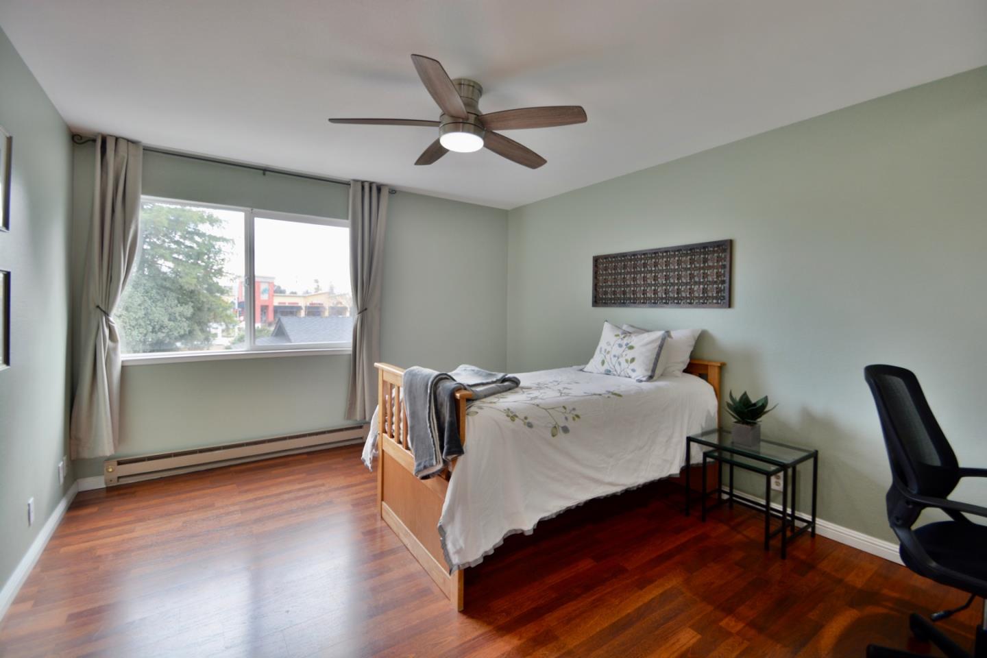 2298 Almaden Road, Unit A San Jose, CA 95125 - Photo 22 of 43 a bed sitting in a room next to a window