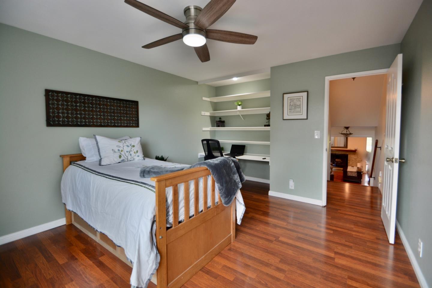 2298 Almaden Road, Unit A San Jose, CA 95125 - Photo 25 of 43 a bedroom with a bed and wooden floor